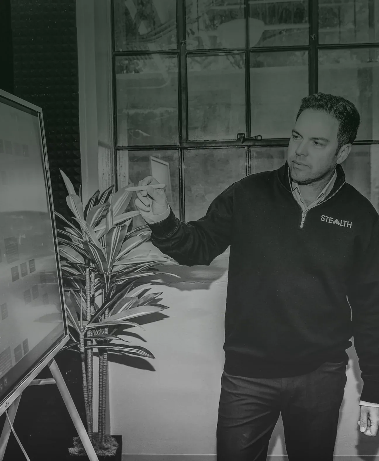 Marketing strategy session at a whiteboard.